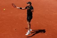 Brandon Nakashima hits a forehand at the Madrid Open | Image Source: Getty